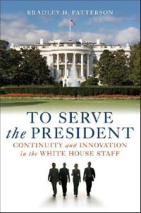 Cover shows South side of the White House, with 
silhouette of four men below it</em>